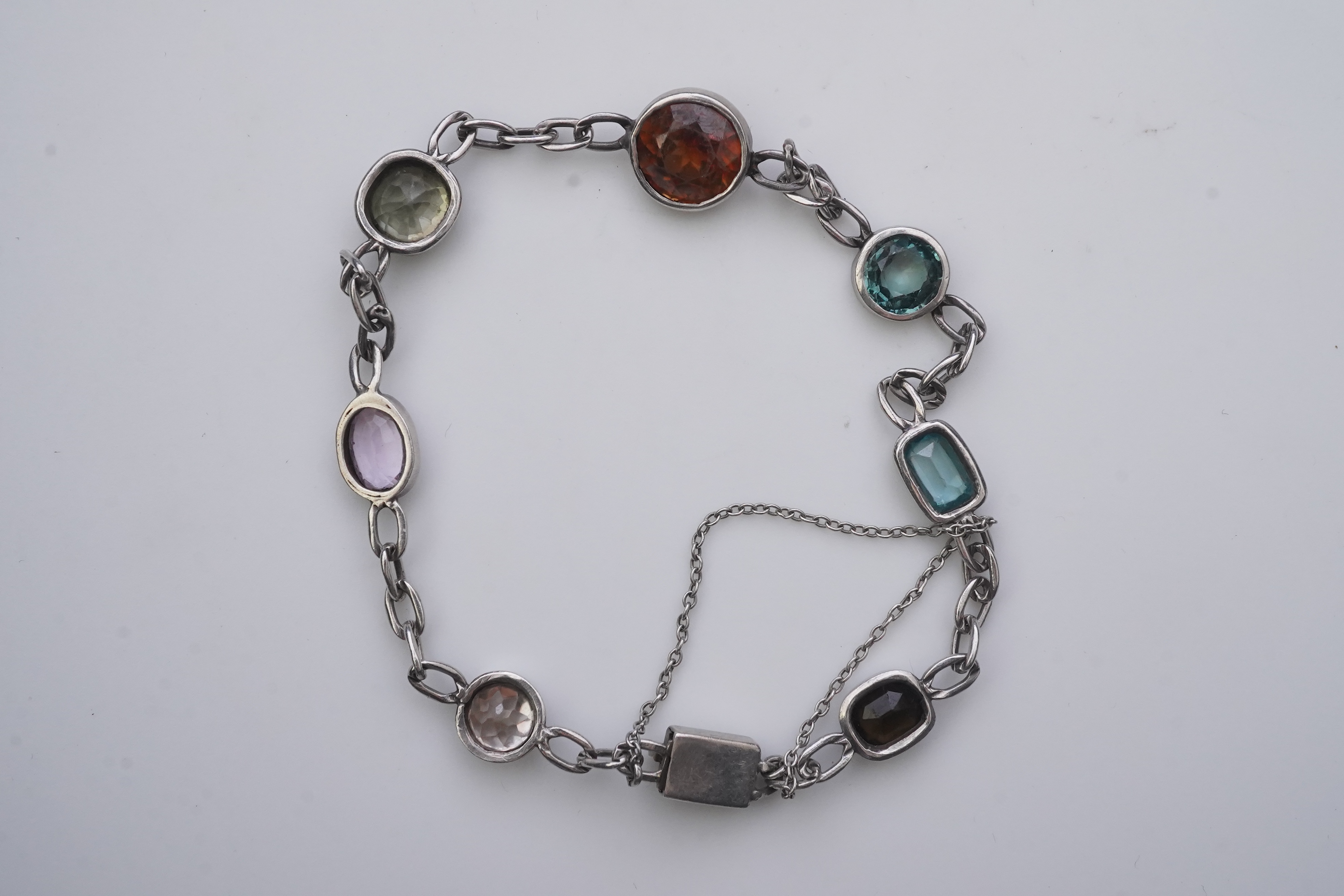 A collection of silver and gem-set jewellery